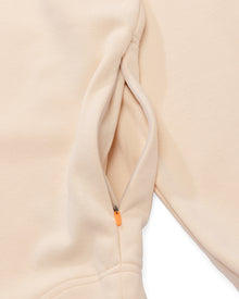 Cream Close-up of orange zipper detail on  Ridgeline Hoodie inspired by hunting gear